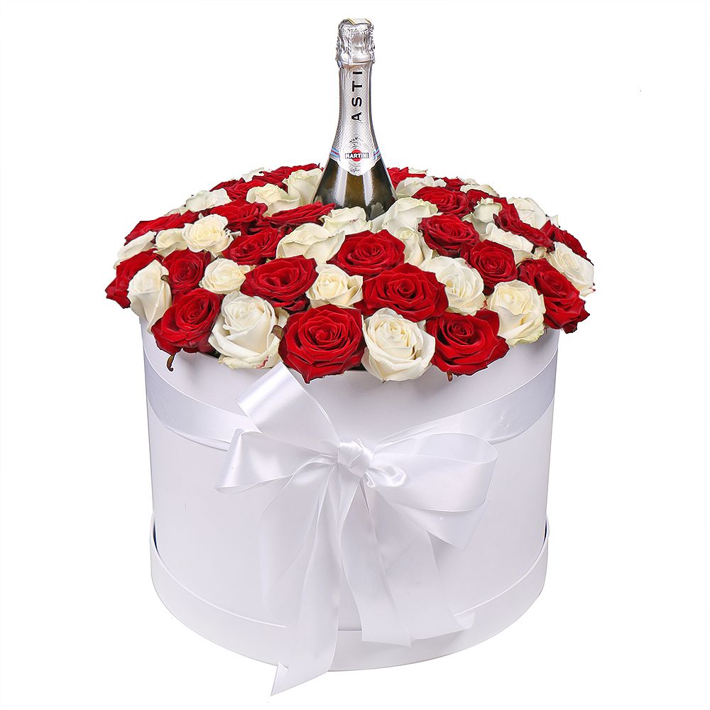 Roses in hat box with a champagne