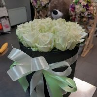 Cream roses in a box